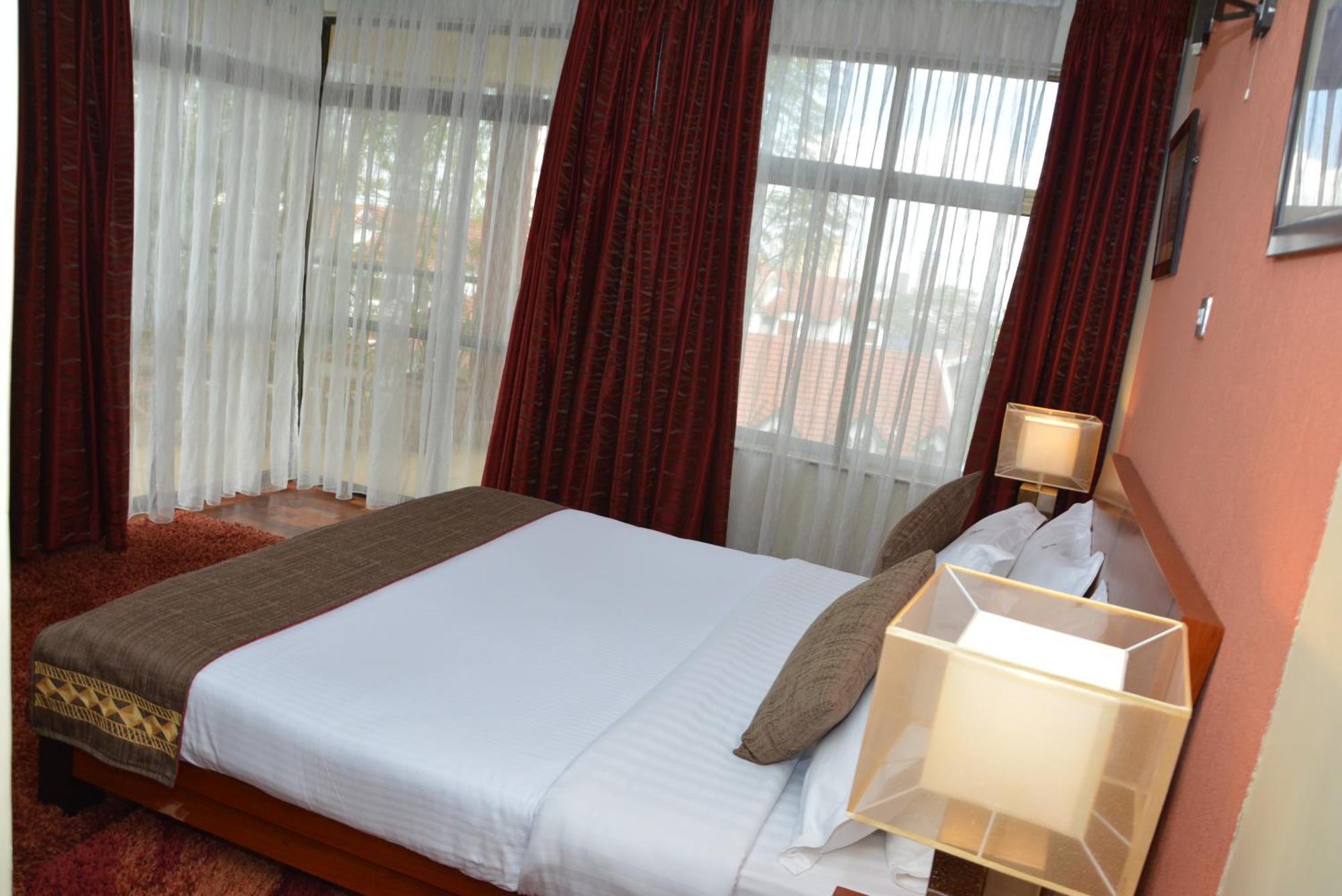 Gemsuites Serviced Apartments State House Найробі Номер фото